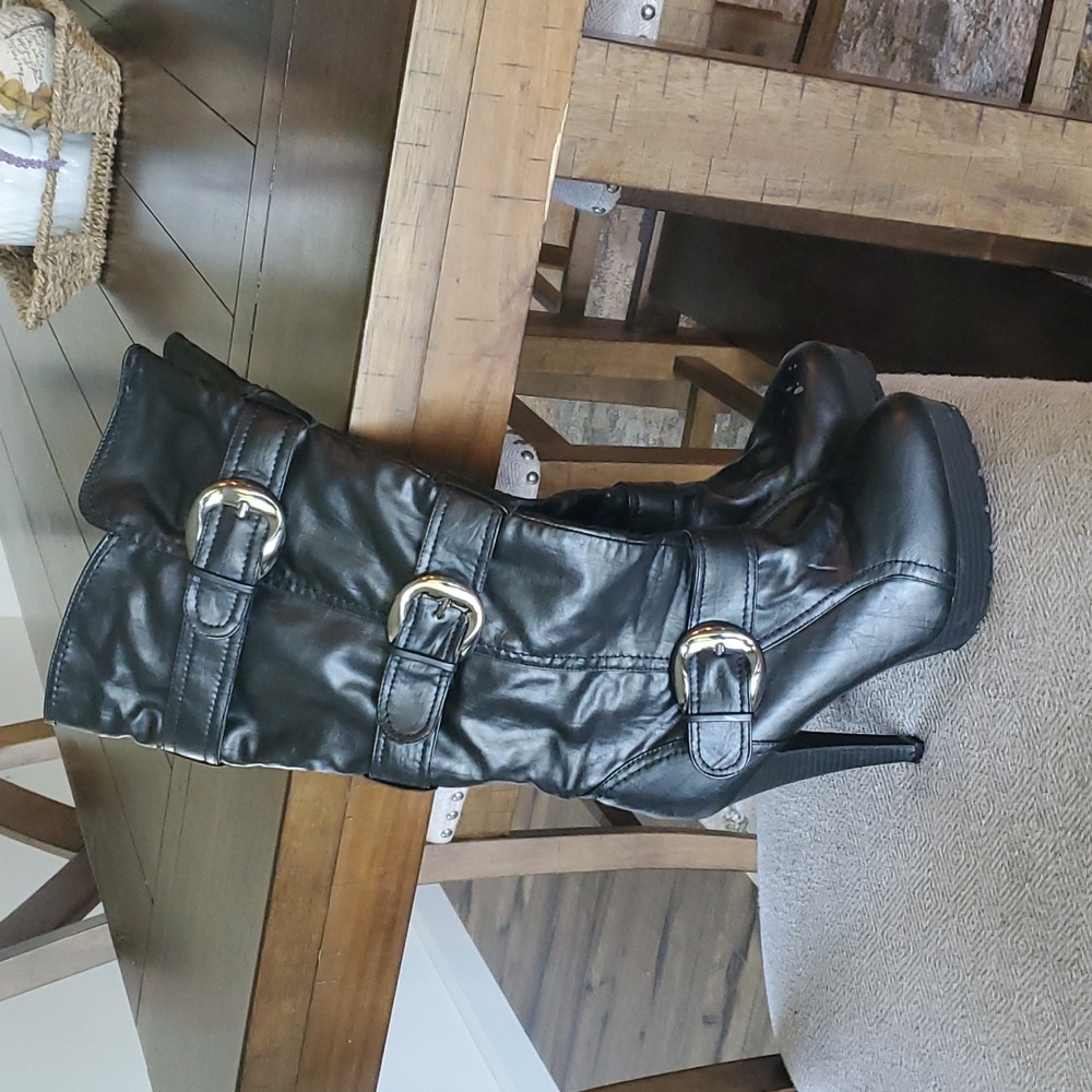 Tall black heeled boots. Size 9